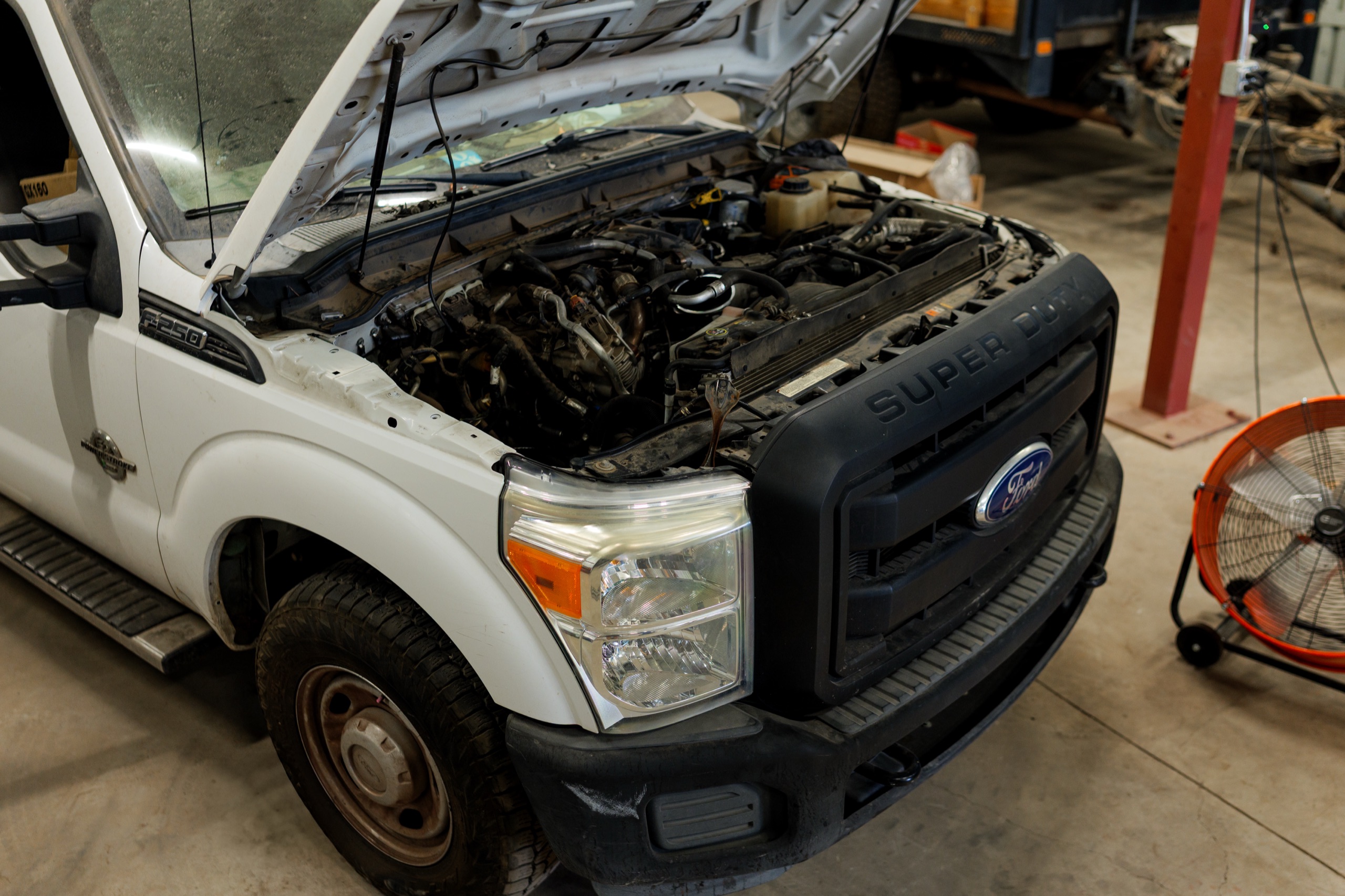 TES technician working on a diesel engine