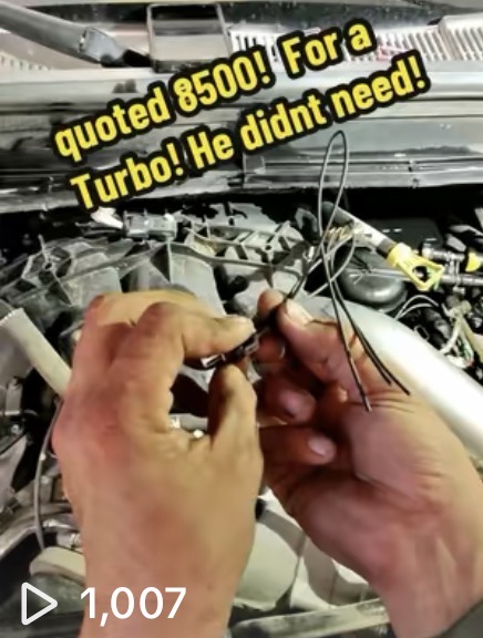 Mobile diesel service in Phoenix - Turbo repair diagnosis showing hands working on engine components